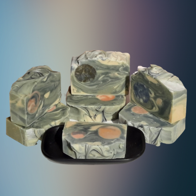 Handmade natural bar soap with "moon" inserts and a blue swirl to look like the night skit